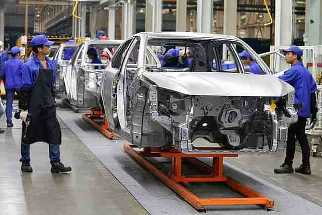 Inside one of BYD's EV making factories in China. Image Source: China Daily